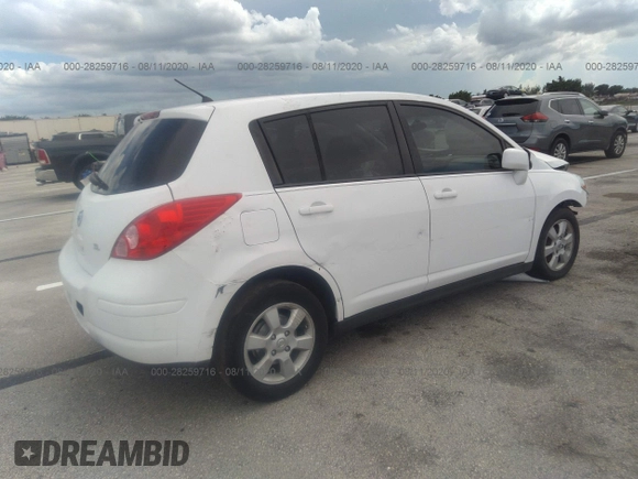2009 Nissan Versa 1.8 S with VIN 3N1BC13E99L406584, listed as a IAAI auction lot 41687026 with 107,454 mi miles. Bid and sale history available at carsss.com. Image 4.