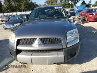 2006 Mitsubishi Raider Duro Cross z VIN 1Z7HT32N96S547869, wystawiony jako Copart lot #78606754 z przebiegiem 123 726 mil mil oraz Czysty tytuł • Clean title. Historia ofert i sprzedaży dostępna na DreamBid. Obrazek 5.