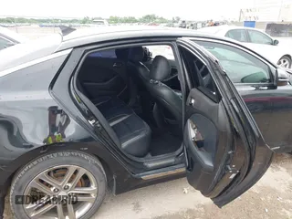2013 Kia Optima SX with VIN 5XXGR4A64DG207512, listed as a IAAI auction lot 42483528 with 127,748 mi miles and . Bid and sale history available at DreamBid. Image 8.