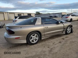 2001 Pontiac Firebird with VIN 2G2FS22K712109736, listed as a Copart auction lot 87247004 with 84,965 mi miles and Clean Title. Bid and sale history available at carsss.com. Image 3.