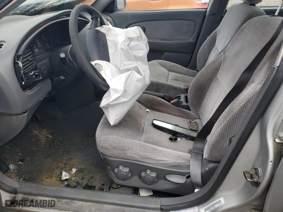 2003 Kia Spectra with VIN KNAFB121835244872, listed as a Copart auction lot 71520674 with 0 mi miles and Salvage Title. Bid and sale history available at carsss.com. Image 7.