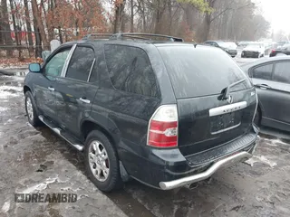 2004 Acura MDX Touring Pkg with VIN 2HNYD18684H532713, listed as a IAAI auction lot 41525616 with 219,241 mi miles. Bid and sale history available at carsss.com. Image 3.