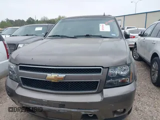 2014 Chevrolet Tahoe LT with VIN 1GNSCBE08ER106419, listed as a IAAI auction lot 41789896 with 99,420 mi miles and . Bid and sale history available at DreamBid. Image 12.