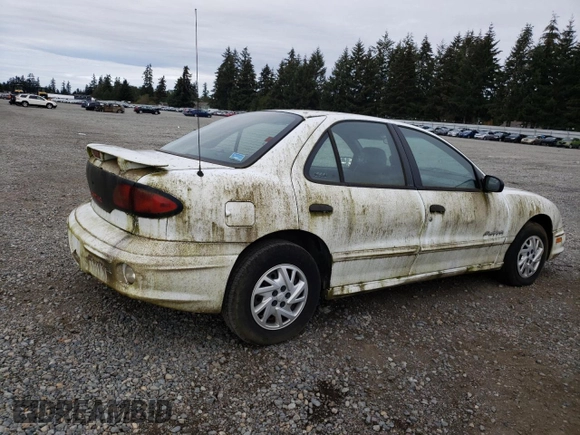 2002 Pontiac Sunfire SE z VIN 1G2JB524327294701, wystawiony jako Copart lot #73310254 z przebiegiem Nie podano mil oraz Czysty tytuł • Clean title. Historia ofert i sprzedaży dostępna na DreamBid. Obrazek 3.