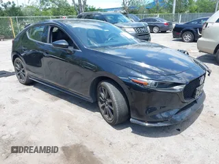 2022 Mazda 3 Premium Plus z VIN JM1BPBNY9N1519421, wystawiony jako IAAI lot #42317689 z przebiegiem 16 867 mil mil oraz . Historia ofert i sprzedaży dostępna na DreamBid. Obrazek 1.