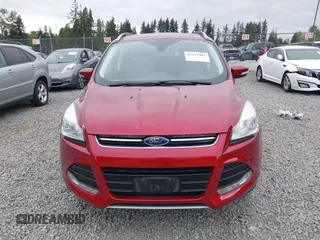 2014 Ford Escape Titanium with VIN 1FMCU9J9XEUD71715, listed as a IAAI auction lot 42127982 with 96,549 mi miles and . Bid and sale history available at DreamBid. Image 12.