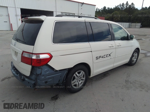2006 Honda Odyssey EX-L with VIN 5FNRL38756B084148, listed as a IAAI auction lot 41694915 with 164,915 mi miles. Bid and sale history available at carsss.com. Image 4.
