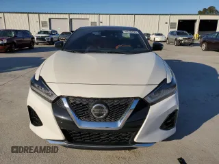 2019 Nissan Maxima Platinum z VIN 1N4AA6AV6KC383738, wystawiony jako Copart lot #46600455 z przebiegiem 94 128 mil mil oraz Szkody całkowita. Historia ofert i sprzedaży dostępna na DreamBid. Obrazek 5.