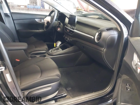 2022 Kia Forte LXS with VIN 3KPF24AD6NE467743, listed as a IAAI auction lot 42019354 with 36,496 mi miles and . Bid and sale history available at DreamBid. Image 5.
