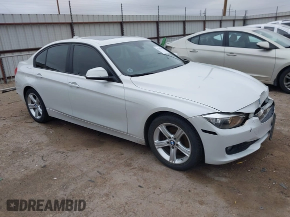 2015 BMW 3 Series 320i with VIN WBA3B1C5XFK140734, listed as a IAAI auction lot 42141319 with 84,863 mi miles and . Bid and sale history available at DreamBid. Image 1.