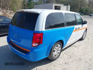 2019 Dodge Grand Caravan SE with VIN 2C4RDGBG8KR646829, listed as a IAAI auction lot 42136947 with 73,015 mi miles and . Bid and sale history available at DreamBid. Image 4.