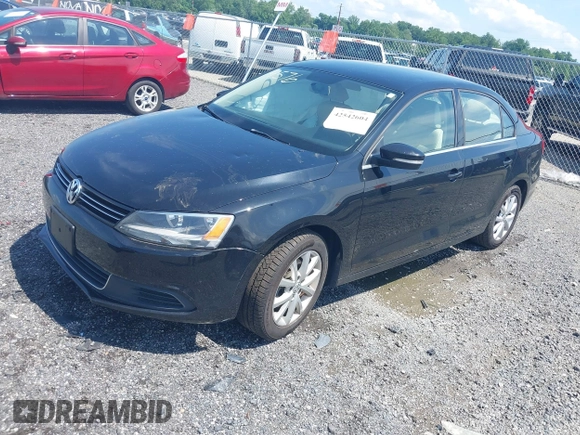 2014 Volkswagen Jetta SE with VIN 3VWD17AJ4EM429576, listed as a IAAI auction lot 42542604 with 142,313 mi miles and . Bid and sale history available at DreamBid. Image 17.