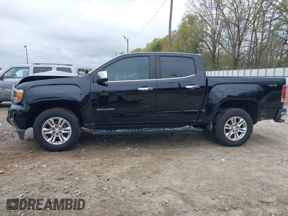 2019 GMC Canyon 4WD SLE with VIN 1GTG6CEN4K1329011, listed as a IAAI auction lot 41920100 with 82,343 mi miles. Bid and sale history available at carsss.com. Image 14.