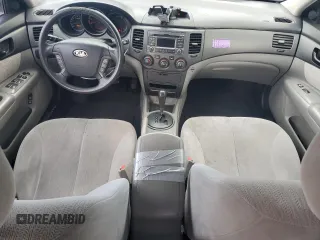 2010 Kia Optima LX z VIN KNAGG4A80A5398981, wystawiony jako Copart lot #59092515 z przebiegiem 153 524 mil mil oraz Szkoda całkowita • Salvage title. Historia ofert i sprzedaży dostępna na DreamBid. Obrazek 8.