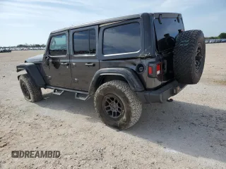 2023 Jeep Wrangler Willys with VIN 1C4HJXDGXPW526093, listed as a Copart auction lot 56818935 with 24,021 mi miles and Salvage title. Bid and sale history available at DreamBid. Image 2.