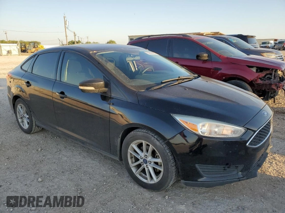 2017 Ford Focus SE with VIN 1FADP3F25HL219608, listed as a Copart auction lot 56559925 with 100,207 mi miles and Salvage title. Bid and sale history available at DreamBid. Image 4.