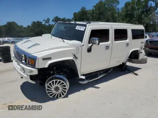 2003 Hummer H2 z VIN 5GRGN23U93H109815, wystawiony jako Copart lot #58188715 z przebiegiem 174 076 mil mil oraz Szkoda całkowita • Salvage title. Historia ofert i sprzedaży dostępna na DreamBid. Obrazek 1.