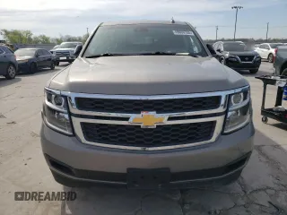 2019 Chevrolet Tahoe LT z VIN 1GNSCBKC8KR396364, wystawiony jako Copart lot #49660755 z przebiegiem 129 014 mil mil oraz Szkoda całkowita • Salvage title. Historia ofert i sprzedaży dostępna na DreamBid. Obrazek 5.