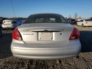 2000 Ford Taurus SE with VIN 1FAFP53U7YG259840, listed as a Copart auction lot 42412595 with 125,226 mi miles and Salvage Title. Bid and sale history available at DreamBid. Image 6.