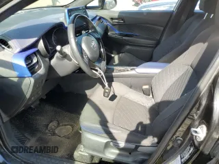 2021 Toyota C-HR LE z VIN NMTKHMBX2MR133802, wystawiony jako Copart lot #54398745 z przebiegiem 152 133 mil mil oraz Szkoda całkowita • Salvage title. Historia ofert i sprzedaży dostępna na DreamBid. Obrazek 7.