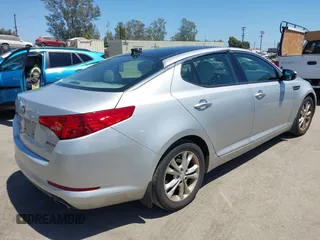 2013 Kia Optima EX with VIN 5XXGN4A72DG199317, listed as a IAAI auction lot 42517407 with 160,402 mi miles and . Bid and sale history available at DreamBid. Image 4.