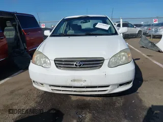 2004 Toyota Corolla CE with VIN JTDBR32E540051928, listed as a IAAI auction lot 41958483 with 299,999 mi miles. Bid and sale history available at carsss.com. Image 13.
