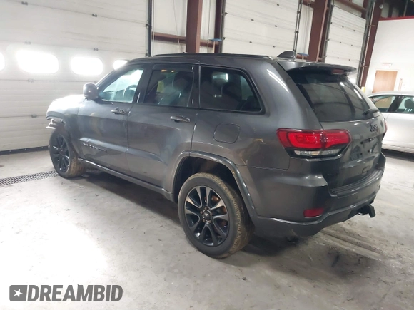 2018 Jeep Grand Cherokee Laredo E with VIN 1C4RJFAG5JC343101, listed as a IAAI auction lot 41211158 with 105,886 mi miles. Bid and sale history available at carsss.com. Image 3.