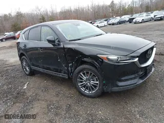 2021 Mazda CX-5 Touring with VIN JM3KFBCM8M0338969, listed as a IAAI auction lot 41350715 with 79,345 mi miles. Bid and sale history available at carsss.com. Image 1.