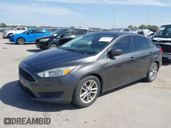 2018 Ford Focus SE with VIN 1FADP3F2XJL302358, listed as a IAAI auction lot 41807622 with 76,145 mi miles. Bid and sale history available at carsss.com. Image 17.