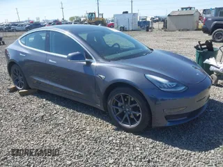 2019 Tesla Model 3 Mid Range with VIN 5YJ3E1EA0KF411103, listed as a IAAI auction lot 41997643 with 46,030 mi miles. Bid and sale history available at carsss.com. Image 1.