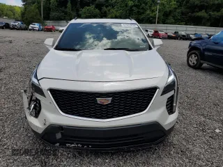 2019 Cadillac XT4 FWD Sport with VIN 1GYFZER44KF210582, listed as a Copart auction lot 61272015 with 104,073 mi miles and Salvage title. Bid and sale history available at DreamBid. Image 5.