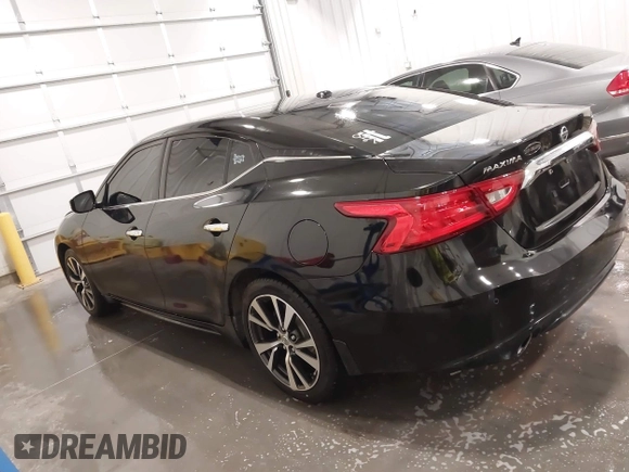 2016 Nissan Maxima SV with VIN 1N4AA6AP7GC437668, listed as a IAAI auction lot 41866666 with 118,582 mi miles and . Bid and sale history available at DreamBid. Image 14.