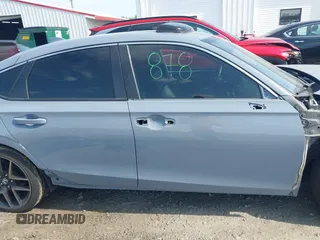2022 Honda Civic Sport Touring z VIN 19XFL1H82NE003000, wystawiony jako IAAI lot #42020685 z przebiegiem 46 740 mil mil oraz . Historia ofert i sprzedaży dostępna na DreamBid. Obrazek 14.