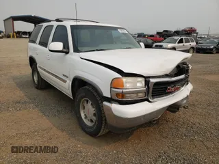 2001 GMC Yukon SLT z VIN 1GKEK13T61J150626, wystawiony jako Copart lot #49920601 z przebiegiem 224 707 mil mil oraz Czysty tytuł • Clean title. Historia ofert i sprzedaży dostępna na DreamBid. Obrazek 1.