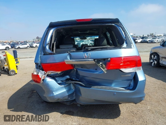 2010 Honda Odyssey Touring with VIN 5FNRL3H92AB056186, listed as a IAAI auction lot 41851386 with 199,109 mi miles. Bid and sale history available at carsss.com. Image 16.