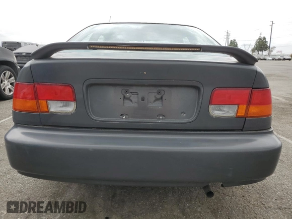 1996 Honda Civic EX z VIN 1HGEJ8146TL091427, wystawiony jako Copart lot #53537235 z przebiegiem 132 490 mil mil oraz Szkoda całkowita • Salvage title. Historia ofert i sprzedaży dostępna na DreamBid. Obrazek 6.