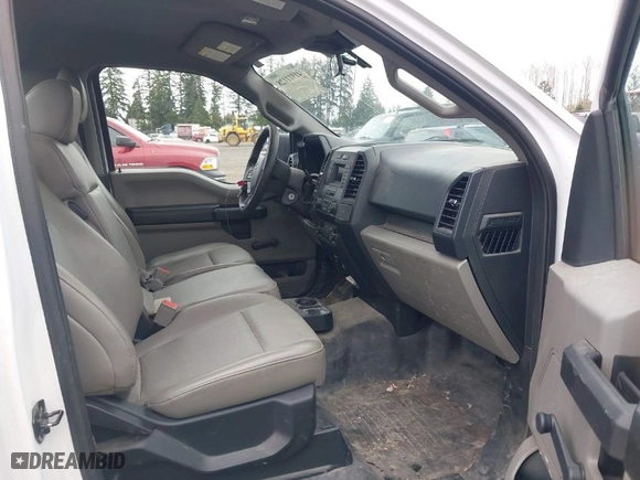2019 Ford F-150 XL with VIN 1FTMF1CB0KKE51407, listed as a IAAI auction lot 41911128 with 135,119 mi miles. Bid and sale history available at carsss.com. Image 5.
