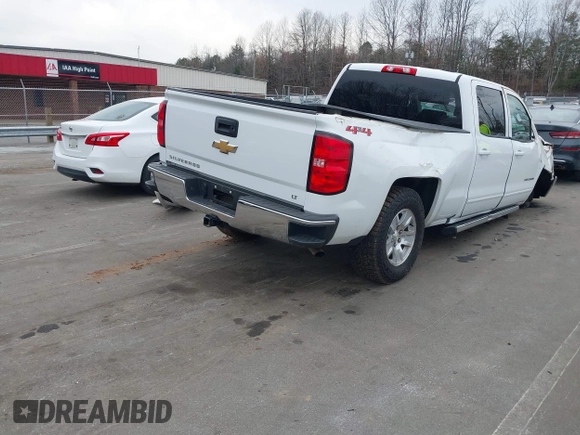 2018 Chevrolet Silverado 1500 LT with VIN 1GCUKREC0JF208509, listed as a IAAI auction lot 41794616 with 96,962 mi miles and . Bid and sale history available at DreamBid. Image 4.