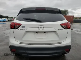2016 Mazda CX-5 Grand Touring with VIN JM3KE2DYXG0839774, listed as a Copart auction lot 52336275 with 125,605 mi miles and Salvage Title. Bid and sale history available at carsss.com. Image 6.