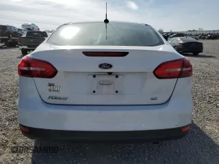 2017 Ford Focus SE z VIN 1FADP3F22HL312683, wystawiony jako Copart lot #53385315 z przebiegiem 88 751 mil mil oraz Szkoda całkowita • Salvage title. Historia ofert i sprzedaży dostępna na DreamBid. Obrazek 6.