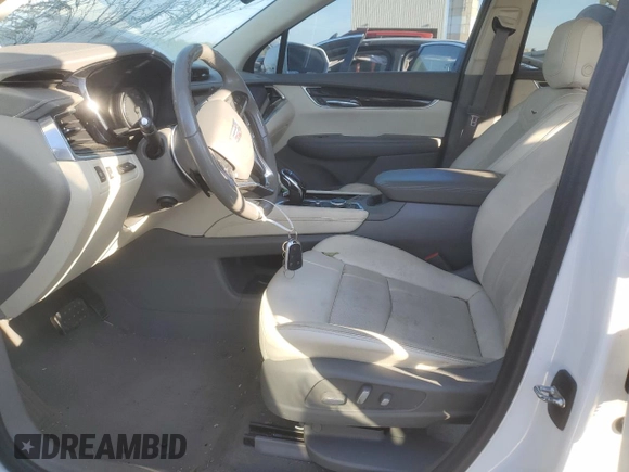 2020 Cadillac XT6 FWD Premium Luxury z VIN 1GYKPCRS9LZ107178, wystawiony jako Copart lot #72359154 z przebiegiem 154 427 mil mil oraz Nie do naprawy. Historia ofert i sprzedaży dostępna na DreamBid. Obrazek 7.