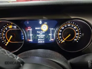 2021 Jeep Wrangler Unlimited Sport S with VIN 1C4HJXDN1MW596334, listed as a IAAI auction lot 41730278 with 64,126 mi miles and . Bid and sale history available at DreamBid. Image 7.