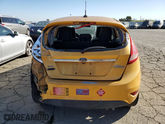2011 Ford Fiesta SES with VIN 3FADP4FJ6BM124655, listed as a Copart auction lot 42670165 with 112,008 mi miles and Salvage Title. Bid and sale history available at carsss.com. Image 6.