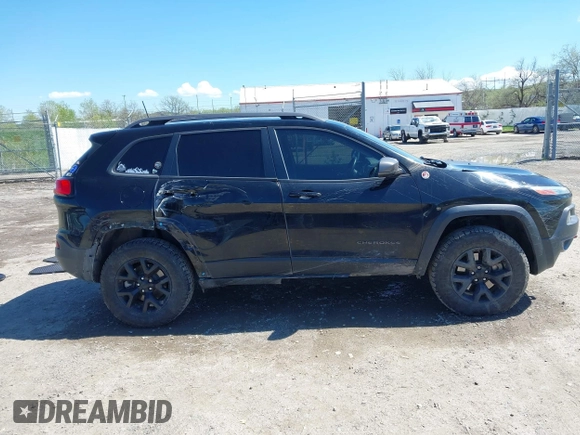 2018 Jeep Cherokee Trailhawk Leather Plus with VIN 1C4PJMBXXJD572667, listed as a IAAI auction lot 42216477 with 85,890 mi miles and . Bid and sale history available at DreamBid. Image 13.