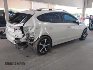 2019 Subaru Impreza Premium with VIN 4S3GTAD62K3707032, listed as a IAAI auction lot 42636552 with 90,278 mi miles and . Bid and sale history available at DreamBid. Image 4.