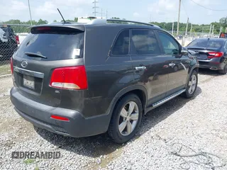 2012 Kia Sorento EX with VIN 5XYKU4A69CG276943, listed as a IAAI auction lot 42604286 with 182,425 mi miles and . Bid and sale history available at DreamBid. Image 4.