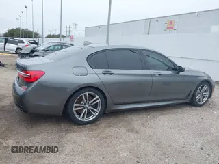 2016 BMW 7 Series 740i with VIN WBA7E2C56GG546920, listed as a IAAI auction lot 41610698 with 119,689 mi miles. Bid and sale history available at carsss.com. Image 13.