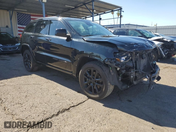 2021 Jeep Grand Cherokee Laredo X with VIN 1C4RJEAG0MC860983, listed as a Copart auction lot 57153715 with 59,697 mi miles and Clean title. Bid and sale history available at DreamBid. Image 4.