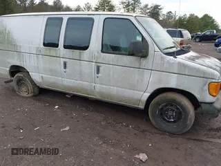 2003 Ford Econoline Cargo with VIN 1FTRE14203HB80127, listed as a IAAI auction lot 41462657 with 111,758 mi miles and . Bid and sale history available at DreamBid. Image 1.