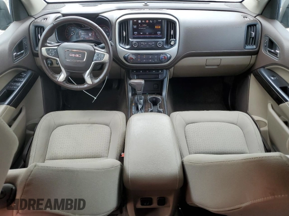 2015 GMC Canyon 4WD SLE with VIN 1GTG6BE38F1263139, listed as a Copart auction lot 75479854 with 124,765 mi miles and Salvage Title. Bid and sale history available at carsss.com. Image 8.